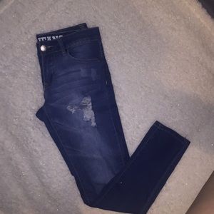 Dark blue ripped jeans